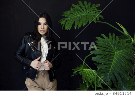 portrait of a beautiful fashionable oriental brunette woman portrait of a beautiful fashionable oriental brunette woman 84911514
