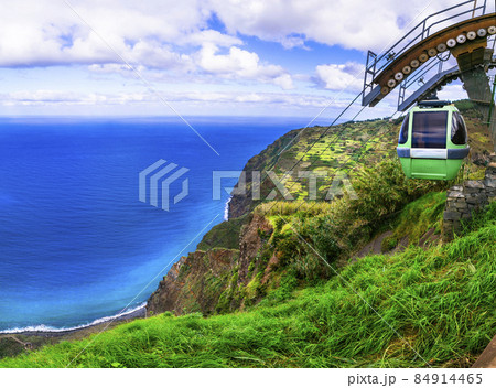 Achadas da Cruz cable car in Madeira island, western part. Spectacular sea and rocky mountains scenery, popular tourist attraction Achadas da Cruz cable car in Madeira island, western part. Spectacular sea and rocky mountains scenery, popular tourist attraction 84914465