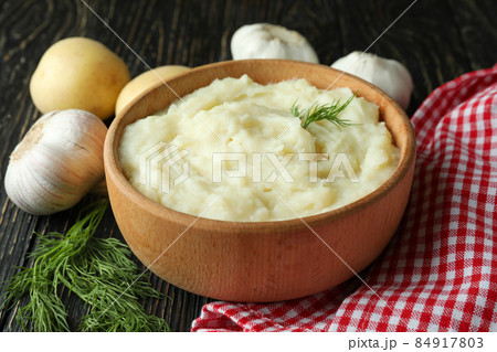Concept of tasty eating with mashed potatoes on wooden table 84917803