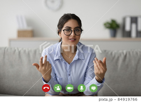 Pov screenshot of young arab female psychologist giving online consultation, talking with client remotely and gesturing Pov screenshot of young arab female psychologist giving online consultation, talking with client remotely and gesturing 84919766