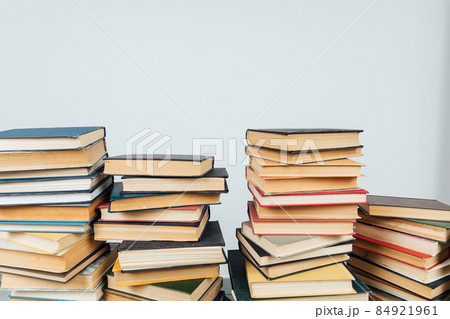 Stacks of books for teaching knowledge of the college university library white background 84921961