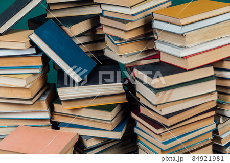 stacks of books for teaching knowledge of the university library green background stacks of books for teaching knowledge of the university library green background 84921981