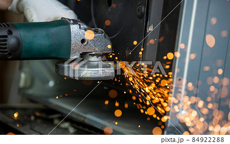 Process of flexion sheet metal cutting with huge sparklings, an industrial concept Process of flexion sheet metal cutting with huge sparklings, an industrial concept 84922288