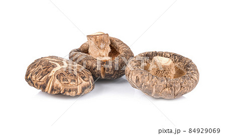 dry shiitake mushrooms isolated on white background dry shiitake mushrooms isolated on white background 84929069