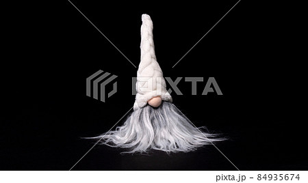 Santa Claus head isolated on black background Santa Claus head isolated on black background 84935674