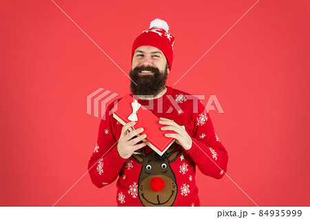 Hipster in winter sweater. Respect traditions. Merry christmas.  84935999