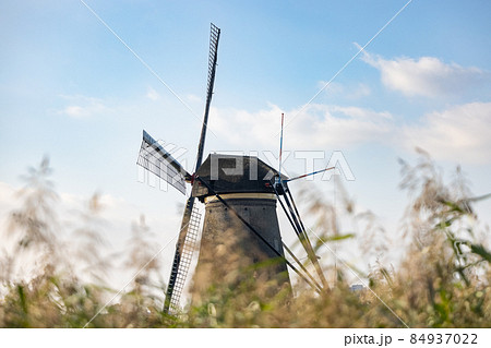 Horizontal picture of one of the famous Dutch windmills at Kinderdijk, a UNESCO world heritage site Horizontal picture of one of the famous Dutch windmills at Kinderdijk, a UNESCO world heritage site 84937022