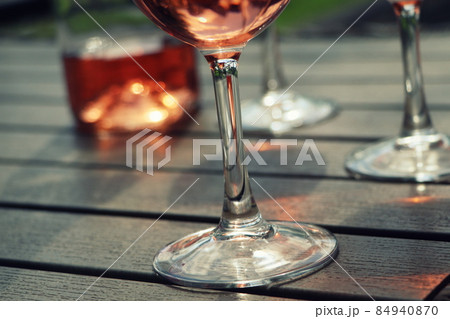 Composition with rose wine glasses , dark backgound 84940870