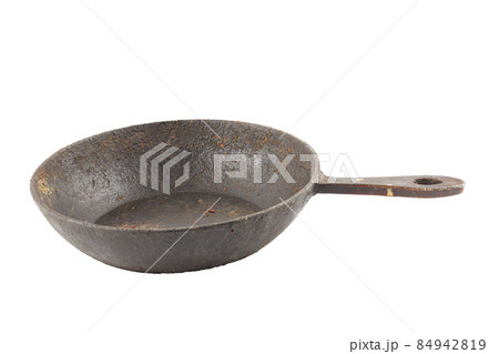 old disgusting stained rusty cast iron pan with burnt fat and food leftovers isolated old disgusting stained rusty cast iron pan with burnt fat and food leftovers isolated 84942819