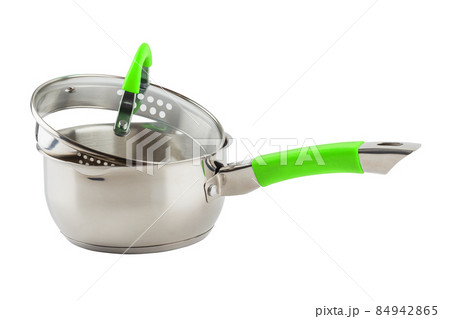 small shiny stainless steel pot with green handle and glass lid - isolated on white small shiny stainless steel pot with green handle and glass lid - isolated on white 84942865