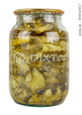 old pickles in glass jar with rusted cap in bad condition isolated on white background 84942957