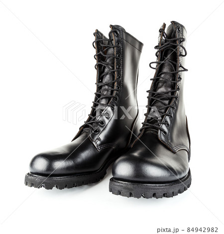 three quarter front view on pair of black leather 10-inch new black military combat boots, isolated on white background 84942982