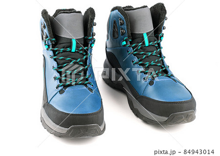 pair of mint blue insulated winter warm three quarter sneaker or boot isolated on white background 84943014