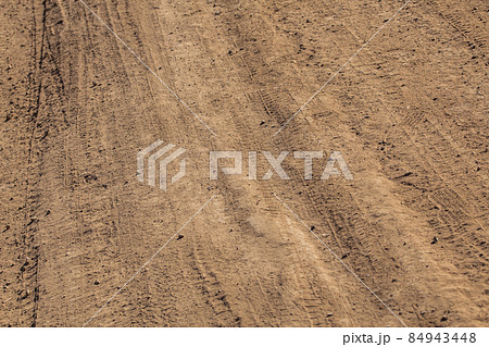 dusty dry dirt road - full frame close-up shot 84943448