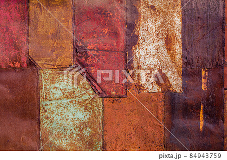 rusted tin sheets patchwork wall texture and flat background 84943759
