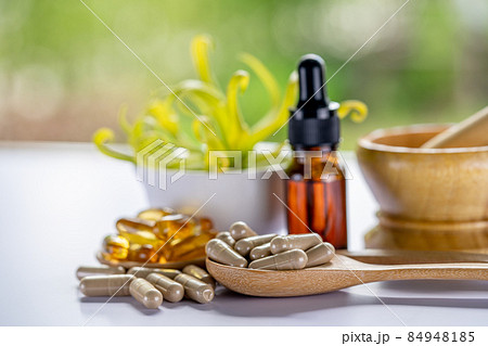 Alternative medicine herbal organic capsule with vitamin E omega 3 fish oil, mineral, drug with herbs leaf natural supplements for healthy good life. Alternative medicine herbal organic capsule with vitamin E omega 3 fish oil, mineral, drug with herbs leaf natural supplements for healthy good life. 84948185