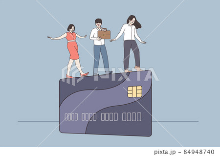 Businesspeople walk on edge of credit card 84948740