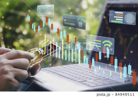 A man using smart phone and laptop for analyzing graph for data management to make report.Financial technology,Laptop ,many graphs.Investment.Photo concept of Data analyst and financial. A man using smart phone and laptop for analyzing graph for data management to make report.Financial technology,Laptop ,many graphs.Investment.Photo concept of Data analyst and financial. 84949511