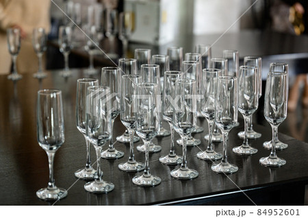 Serving champagne glasses at a solemn event. Serving champagne glasses at a solemn event. 84952601