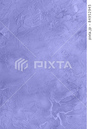 Textured concrete background toned in very peri color 84952945
