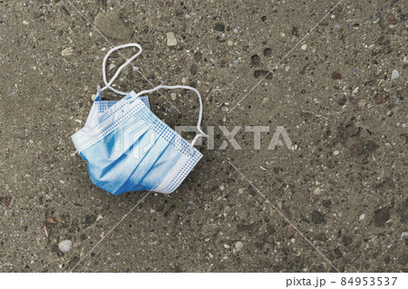 The used mask lies on the road The used mask lies on the road 84953537
