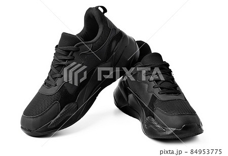 New black sneakers isolated on white background New black sneakers isolated on white background 84953775