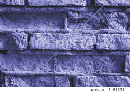 Brick wall background tinted in trendy Very Peri color Brick wall background tinted in trendy Very Peri color 84956554