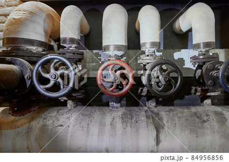 Industrial valve in an old factory Industrial valve in an old factory 84956856