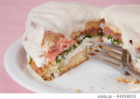 pancakes with fish, lettuce leaves and vegetables, a hot dish for lunch, pastries with sour cream pancakes with fish, lettuce leaves and vegetables, a hot dish for lunch, pastries with sour cream 84958053