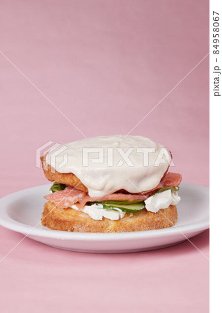 pancakes with fish, lettuce leaves and vegetables, a hot dish for lunch, pastries with sour cream 84958067