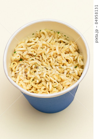 Instant Noodles in Blue Cup on White Background Instant Noodles in Blue Cup on White Background 84958131