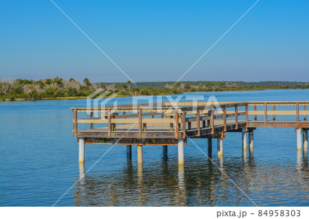 A Fishing Pier on the Intracoastal Waterway at Bings landing, Flagler County, Florida A Fishing Pier on the Intracoastal Waterway at Bings landing, Flagler County, Florida 84958303