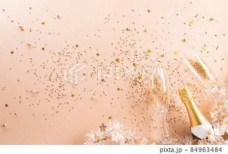 Happy new year celebration background concept made from champagne and glasses on pastel background. Happy new year celebration background concept made from champagne and glasses on pastel background. 84963484