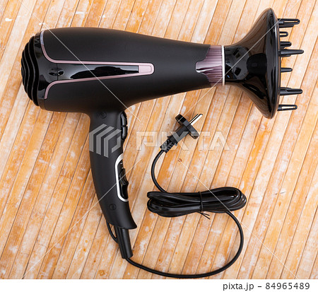Modern electrical hair dryer 84965489