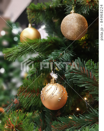 Christmas tree decorated with beautiful ornaments. 84968224