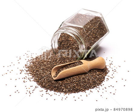 glass can full of organic natural chia seeds close-up isolated on white background 84970898