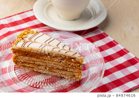 Slice of traditional georgian esterhazi cake close up Slice of traditional georgian esterhazi cake close up 84974616