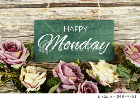 Happy Monday typography text with roses flowers bouquet on wooden background 84974761