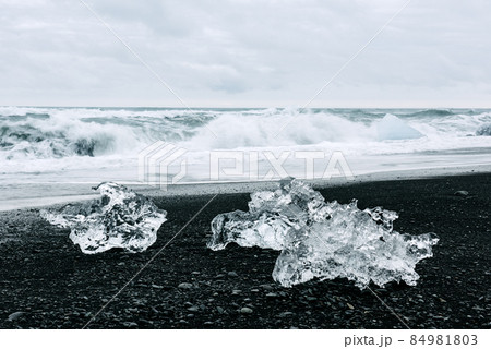 Iceberg pieces on Diamond beach Iceberg pieces on Diamond beach 84981803