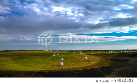 Agriculture landscape with hay bales, Iceland Agriculture landscape with hay bales, Iceland 84982002