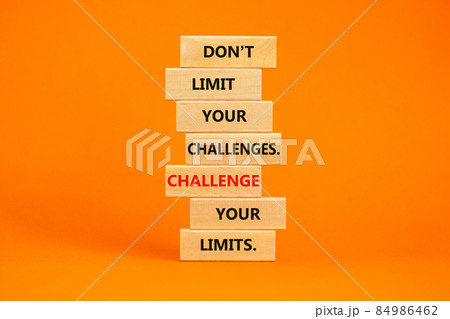 Do not limit your challenges symbol. Wooden blocks with words Do not limit your challenges. Challenge your limits. Beautiful orange background, copy space. Business concept. Do not limit your challenges symbol. Wooden blocks with words Do not limit your challenges. Challenge your limits. Beautiful orange background, copy space. Business concept. 84986462