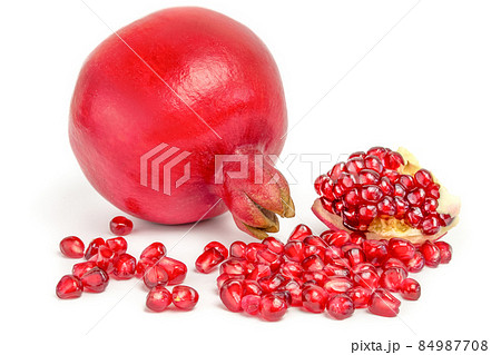 Delicious pomegranate fruit isolated on white. 84987708