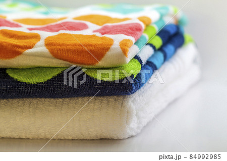 Colorful cotton bath towels on white background 84992985