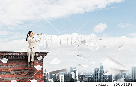 Beautiful young woman with trumpet 85001192