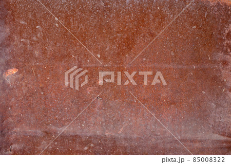 Rusty metal noisy background. Red metal texture with rust. Rust stains a lot Rusty metal noisy background. Red metal texture with rust. Rust stains a lot 85008322