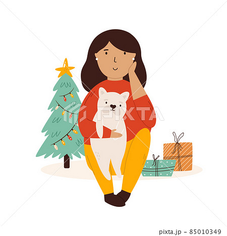 Young girl sitting with her dog. Christmas scene with a pet, holiday tree Young girl sitting with her dog. Christmas scene with a pet, holiday tree 85010349