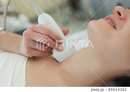 Ultrasound scanning diagnostic for woman of thyroid gland in hospital Ultrasound scanning diagnostic for woman of thyroid gland in hospital 85014362