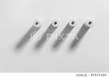 AA size alkaline batteries on a white background. Several batteries in a row. Space for text. AA size alkaline batteries on a white background. Several batteries in a row. Space for text. 85015498