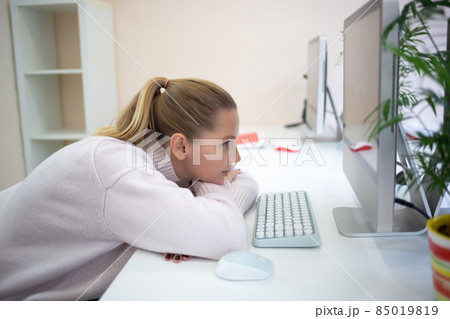young woman is sad at the workplace. office work concep 85019819