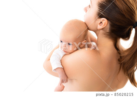 baby on mother's breast on a white background, Concept of caring for the health of a newborn baby 85020215